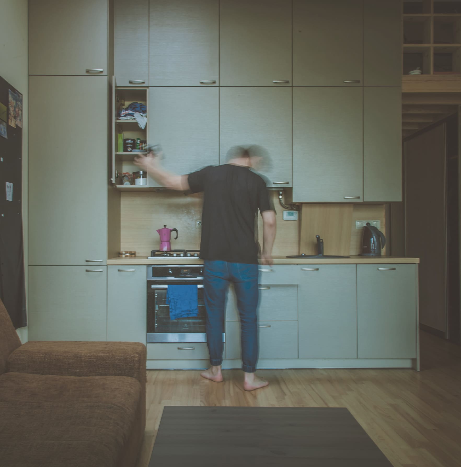 renter making lunch in his home